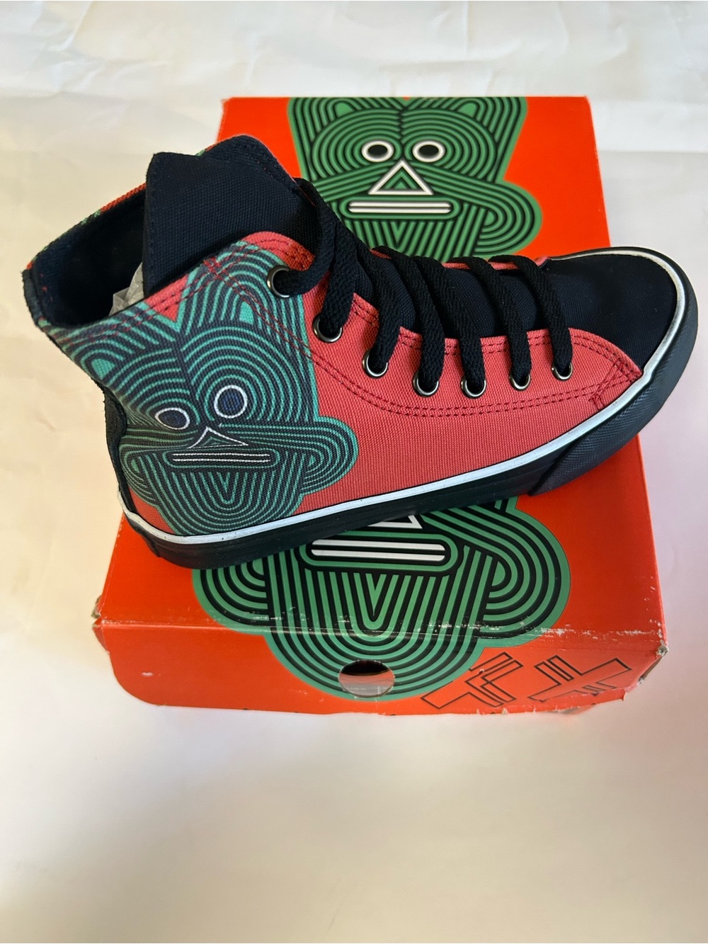 Blanx Mascara High-Top Canvas Sneaker in Red, Black & Teal Graphic
